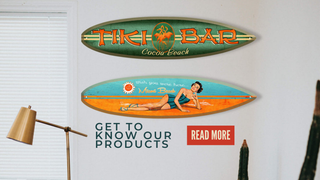 Wooden surfboard signs hung up on wall as home decor from oldwoodsigns.com